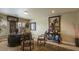 Comfortable home office with dark wood desk, decor, and natural light from a window at 11241 Pentland Downs St, Las Vegas, NV 89141
