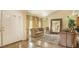 Inviting living room features high ceilings, marble floors, and neutral-colored furniture at 11241 Pentland Downs St, Las Vegas, NV 89141