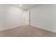 Bright bedroom featuring neutral carpeting and fresh, white walls at 12457 Sunset Sage Ave, Las Vegas, NV 89138