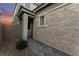 Charming home with decorative stone exterior and an inviting covered entry at 12457 Sunset Sage Ave, Las Vegas, NV 89138