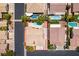 Aerial view of the property, showcasing a well-maintained home with a pool and landscaped backyard in a desirable neighborhood at 1453 Doggett Ave, Las Vegas, NV 89123