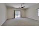 Spacious bedroom with backyard access and view to a private pool at 1453 Doggett Ave, Las Vegas, NV 89123