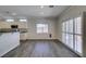 Dining area with stylish flooring, natural light, and access to the kitchen at 1453 Doggett Ave, Las Vegas, NV 89123