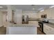 Charming kitchen features granite countertops, stainless steel appliances and ample cabinet space at 1453 Doggett Ave, Las Vegas, NV 89123