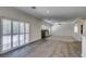 Spacious living room featuring an open floor plan with access to the kitchen at 1453 Doggett Ave, Las Vegas, NV 89123