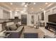 Bright living space with kitchen and seating area, stainless appliances and modern finishes at 15 Golden Sunray Ln, Las Vegas, NV 89135