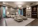 Elegant main bedroom showcasing a fireplace, sitting area, and ambient lighting at 15 Golden Sunray Ln, Las Vegas, NV 89135