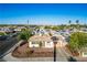 Charming single-story home boasts a well-maintained front yard and desert landscaping at 1716 Luning Dr, Las Vegas, NV 89106