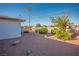 Low-maintenance backyard with decorative rock and sparse landscaping at 1716 Luning Dr, Las Vegas, NV 89106