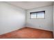 This bedroom has a window, neutral walls, and carpet at 1716 Luning Dr, Las Vegas, NV 89106