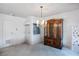 Bright dining room featuring tile floors and a vintage chandelier at 1716 Luning Dr, Las Vegas, NV 89106