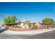 Charming single-story home with a well-maintained yard, gated entrance, and attached one-car garage at 1716 Luning Dr, Las Vegas, NV 89106