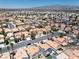 A beautiful view of a house located in a sprawling neighborhood at 1826 Monte Alban Dr, North Las Vegas, NV 89031