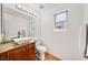 Bathroom featuring vessel sink, vanity and large mirror at 1826 Monte Alban Dr, North Las Vegas, NV 89031