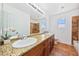 Bathroom featuring granite counters and double sinks at 1826 Monte Alban Dr, North Las Vegas, NV 89031