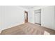 Neutral carpet and white walls in this bedroom with a sliding door closet at 1826 Monte Alban Dr, North Las Vegas, NV 89031