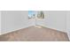 Empty bedroom featuring neutral carpet and two windows at 1826 Monte Alban Dr, North Las Vegas, NV 89031