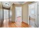 Hallway featuring hardwood floors and multiple doorways at 1826 Monte Alban Dr, North Las Vegas, NV 89031