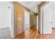 Hallway featuring hardwood floors and a built-in cabinet at 1826 Monte Alban Dr, North Las Vegas, NV 89031