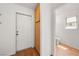 Hallway with tile floors and access to a toilet room at 1826 Monte Alban Dr, North Las Vegas, NV 89031