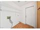 Well lit laundry room with tile floor and metal shelving at 1826 Monte Alban Dr, North Las Vegas, NV 89031