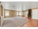 Spacious living room with carpet, neutral paint and many windows for lots of natural light at 1826 Monte Alban Dr, North Las Vegas, NV 89031