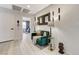 Inviting hallway with stylish decor, wood flooring, and a view into a cozy living area at 2370 Via Firenze, Henderson, NV 89044