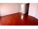 Bedroom with hardwood floor and an access door to a bathroom at 2405 Prime Advantage Ave, North Las Vegas, NV 89032