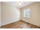 Comfortable bedroom with wood flooring, ceiling fan and ample natural light at 2540 Binary Stars St, Henderson, NV 89044