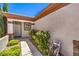 Close-up of front entrance with a white door and desert landscaping at 2540 Binary Stars St, Henderson, NV 89044