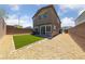 Spacious backyard features low maintenance desert landscaping and artificial turf at 2732 Roman Palm Rd, North Las Vegas, NV 89086