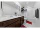 Modern bathroom with double vanity, decorative mirror, and shower-tub combination at 2732 Roman Palm Rd, North Las Vegas, NV 89086