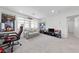 Spacious loft area with entertainment setup and comfortable seating at 2732 Roman Palm Rd, North Las Vegas, NV 89086