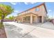 Rear view of the property showing a covered patio, offering outdoor space for relaxation and entertainment at 2755 Asgard Ave, Las Vegas, NV 89121