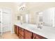 Bathroom with dual sinks, large mirror, and tile flooring at 2755 Asgard Ave, Las Vegas, NV 89121