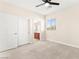 Bedroom with large closet, ceiling fan, bright window and en-suite bathroom at 2755 Asgard Ave, Las Vegas, NV 89121