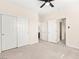 Spacious carpeted bedroom with closet space, and doorway to other rooms at 2755 Asgard Ave, Las Vegas, NV 89121
