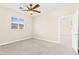 Bedroom featuring neutral carpeting, ceiling fan, and doorway access to other areas of the home at 2755 Asgard Ave, Las Vegas, NV 89121