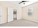 Well-lit carpeted bedroom with blinds and multiple electrical outlets at 2755 Asgard Ave, Las Vegas, NV 89121