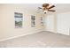 Bright bedroom with a ceiling fan and plenty of natural light from multiple windows at 2755 Asgard Ave, Las Vegas, NV 89121