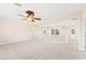 Bonus room with bright natural light, neutral carpet and ceiling fan at 2755 Asgard Ave, Las Vegas, NV 89121