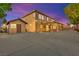 Home exterior with separate shed, large concrete area, and covered patio at 2755 Asgard Ave, Las Vegas, NV 89121