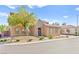 Charming stucco home with stone accents, desert landscaping, and a welcoming entrance at 2755 Asgard Ave, Las Vegas, NV 89121