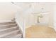 A bright foyer boasts tile flooring and leads to a staircase and living spaces at 2755 Asgard Ave, Las Vegas, NV 89121