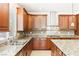 Modern kitchen with stainless steel appliances, granite counters, and tile backsplash at 2755 Asgard Ave, Las Vegas, NV 89121