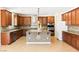 Gourmet kitchen features an island, stainless steel appliances, and granite countertops at 2755 Asgard Ave, Las Vegas, NV 89121