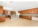 Spacious kitchen with an island, granite countertops, and tile flooring at 2755 Asgard Ave, Las Vegas, NV 89121