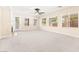 Spacious living area with carpeted floors, ceiling fan and a backyard view at 2755 Asgard Ave, Las Vegas, NV 89121