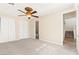 Comfortable main bedroom with a ceiling fan, closet, and ensuite bathroom entrance at 2755 Asgard Ave, Las Vegas, NV 89121