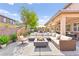 Stylish outdoor patio featuring comfortable seating and a modern fire pit at 2755 Asgard Ave, Las Vegas, NV 89121